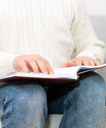 Person Holding Book